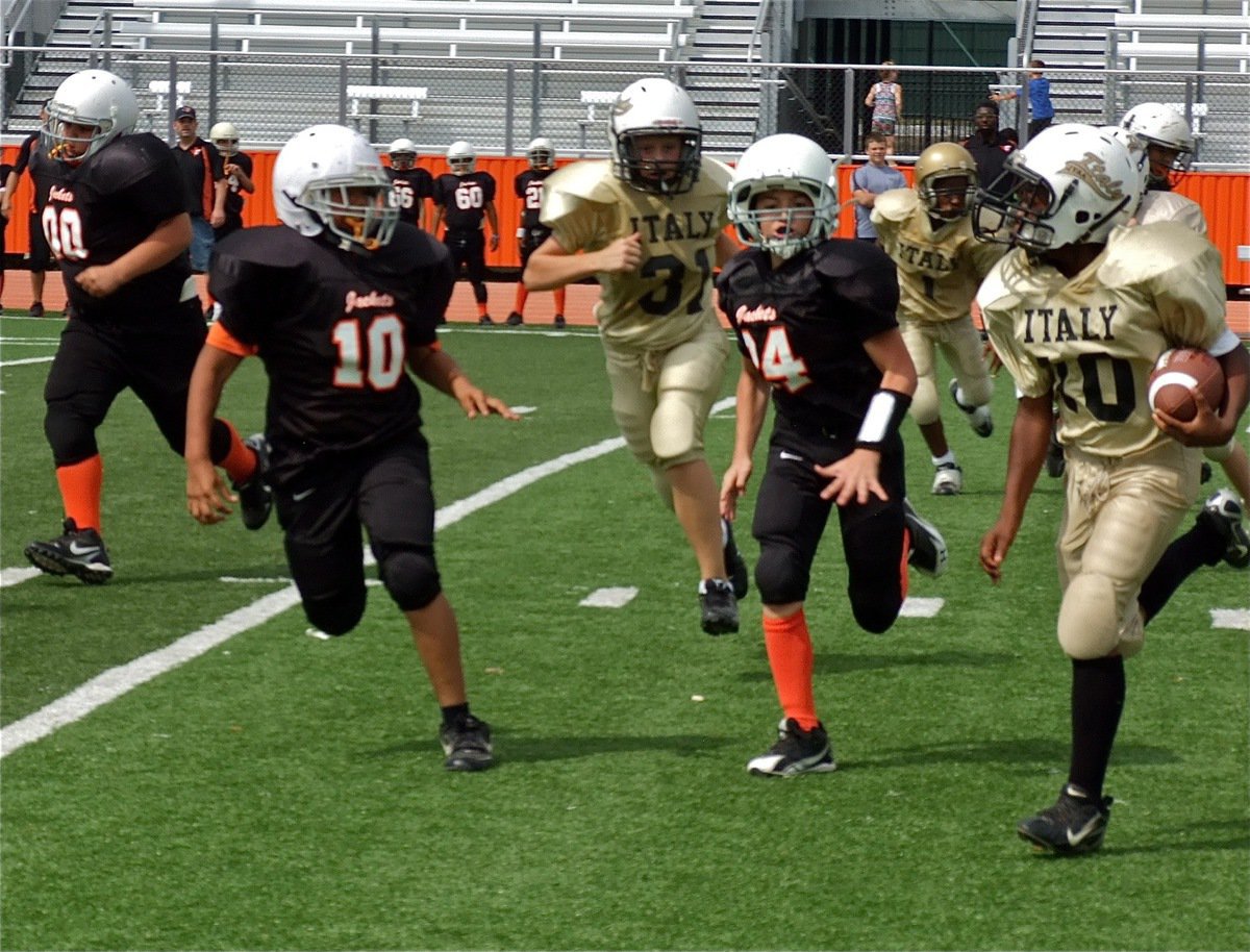 Image: Kendrick Norwood(10) finds running room around the edge of the Ferris defense.