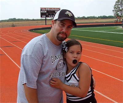 Image: Coach Barry and Nevaeh enjoy the IYAA games in Ferris.