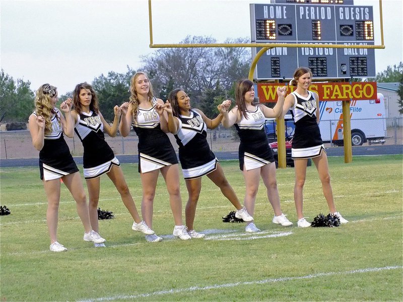 Image: The Italy High School Cheerleaders unite during the playing of the school song by the Gladiator Regiment Marching Band before the matchup between Italy and the Hubbard Jaguards.
