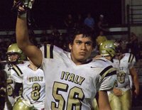 Image: A symbolic moment from senior Omar Estrada(56) after the Gladiators 36-22 triumph over the Jaguars. 