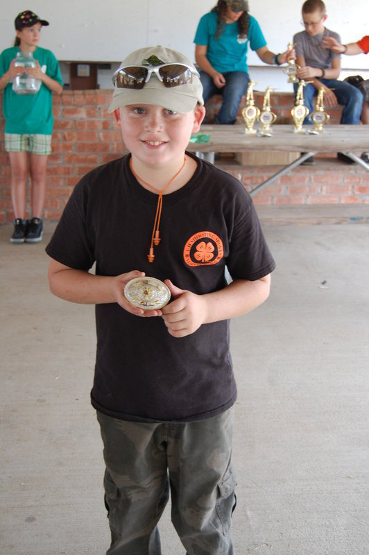 Image: Hunter Hinz, 4th grader at Stafford Elementary in Italy, won the Junior Champion Buckle at the Ellis County 4-H Shooting Sports Fun shoot.