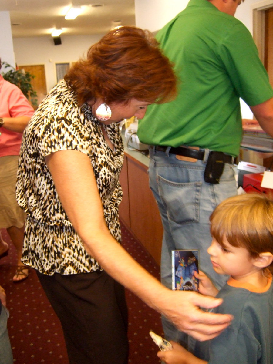 Image: Charlotte Morgan doing what she does best helping this student. Is this the book you want?