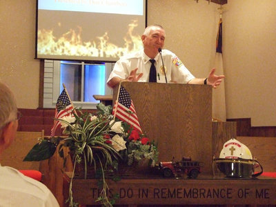 Image: Chief Donald Chambers remembered the history of the Italy Fire Department.