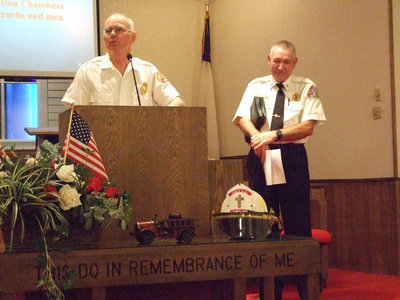 Image: Firefighter Chaplain Ronnie Dabney introduced Fire Chief Donald Chambers as a good friend.