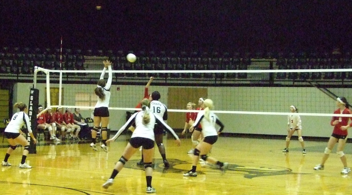 Image: 
    	Alyssa Richards blocks Maypearl from scoring.
    