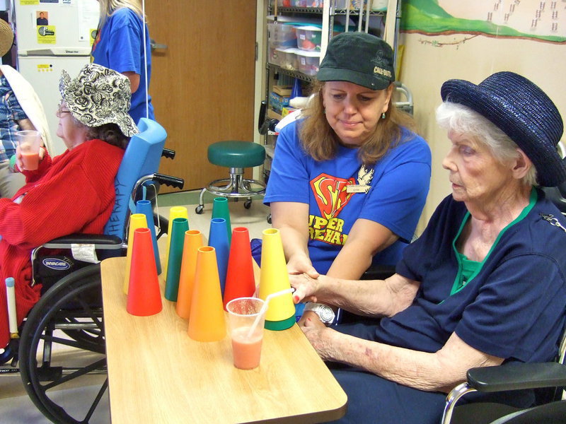 Image: All decked out in hats during a therapy lesson.