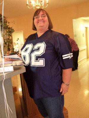 Image: Even Carolyn Powell (activities director) joins in the fun with her favorite jersey.