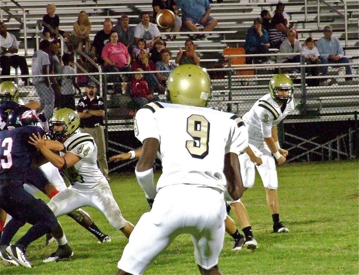 Image: With tight end Ethan Saxon(44) blocking a Red Oak Life defender, Gladiator quarterback Jase Holden((3) fires a pass out to teammate Devonta Simmons(9) as part of an Italy 46-0 win.