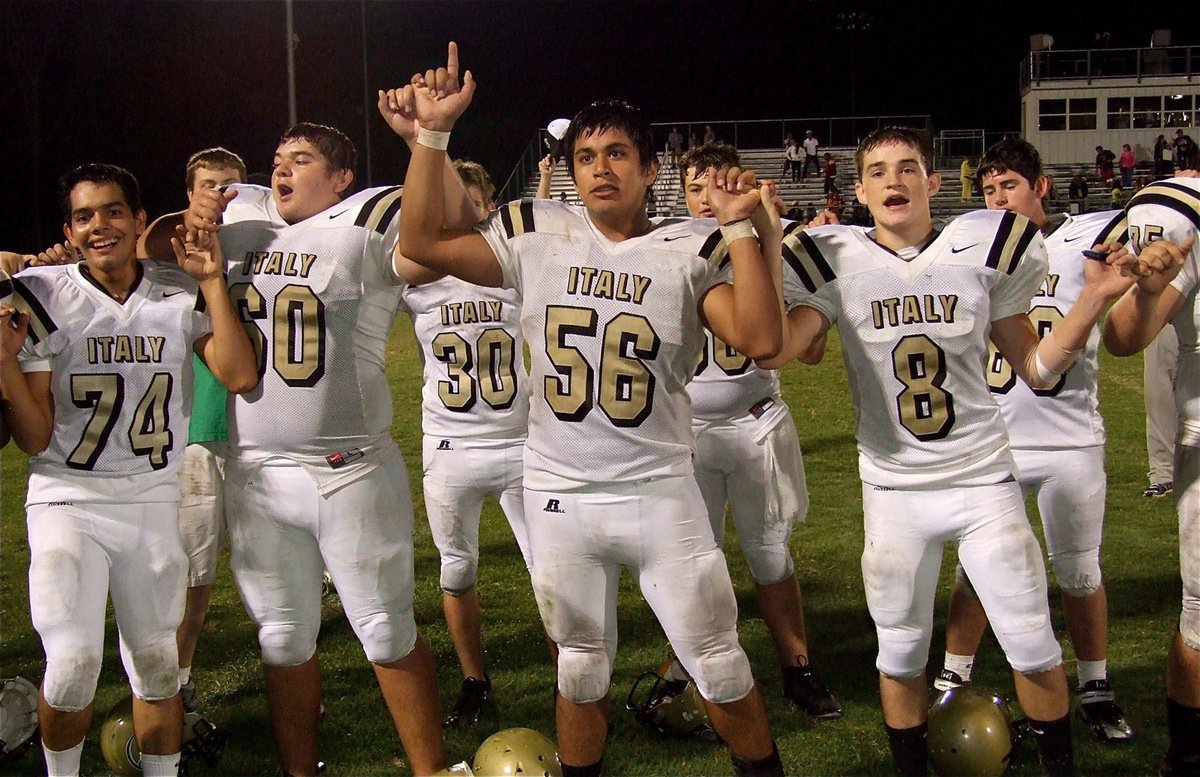 Image: Gladiators Braulio luna(74), Kevin Roldan(60), Omar Estrada(56) and Hayden Woods(8) sing their school song loud and extremely proud.