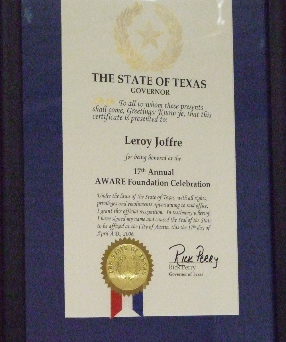 Image: Govenor Rick Perry recognized Joffre in the AWARE celebration.