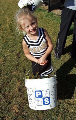 Image: A bucket full of C-Team spirit and a smile.