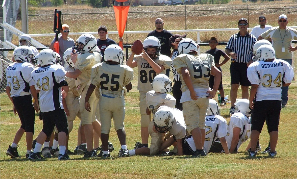 Image: Isaac Salcido(80) retrieves his second fumble recovery from the Bulldogs.