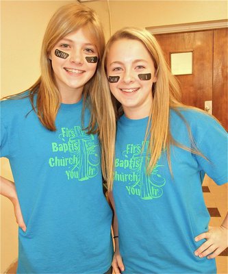Image: Halee Turner and Brittany Chambers are a pair of sporty church twins as they represent the First Baptist Church of Italy’s youth group during Twin Day at IHS.