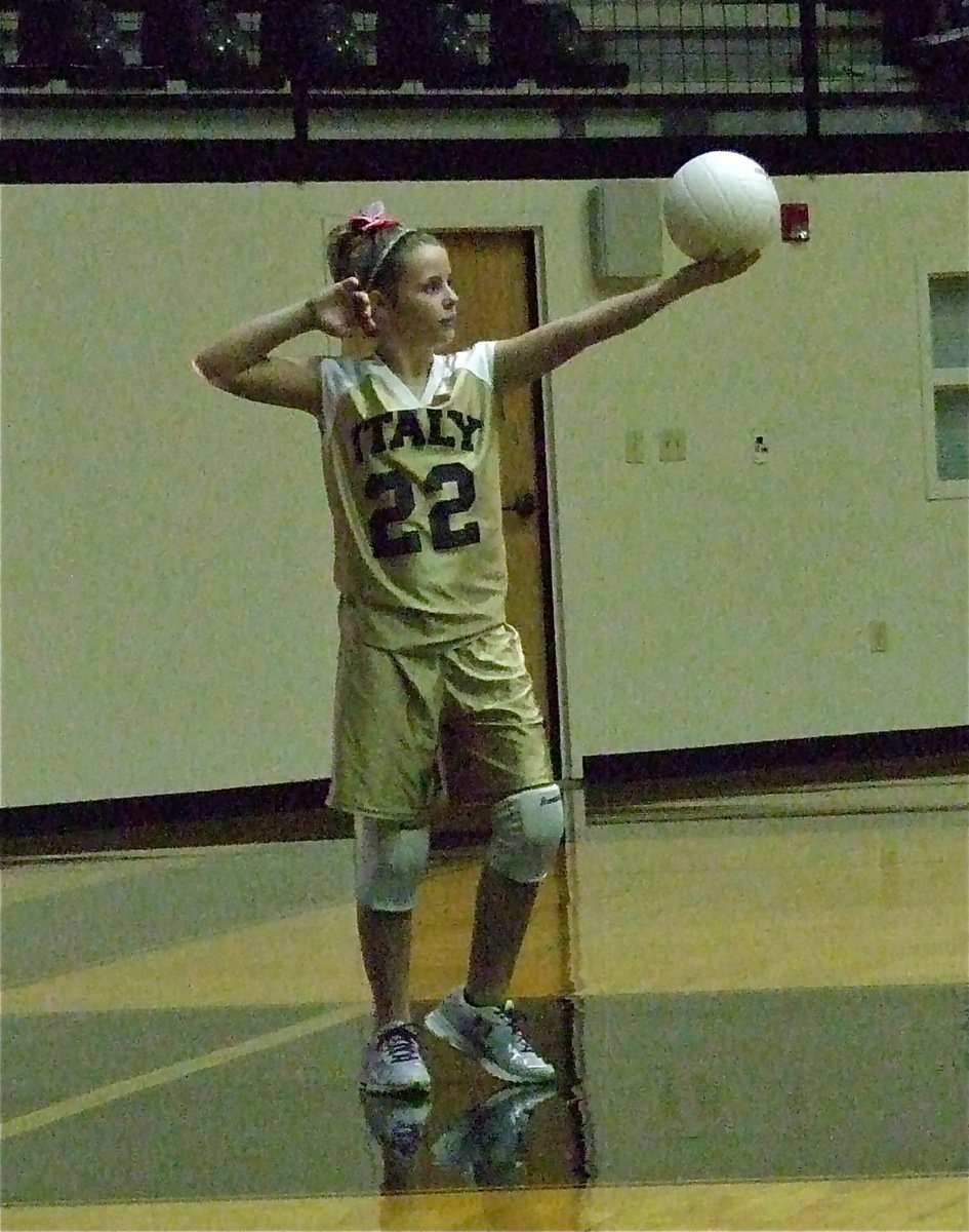 Image: Peyton Henderson serves for the Italy Jr. High Lady Gladiators “B” team.