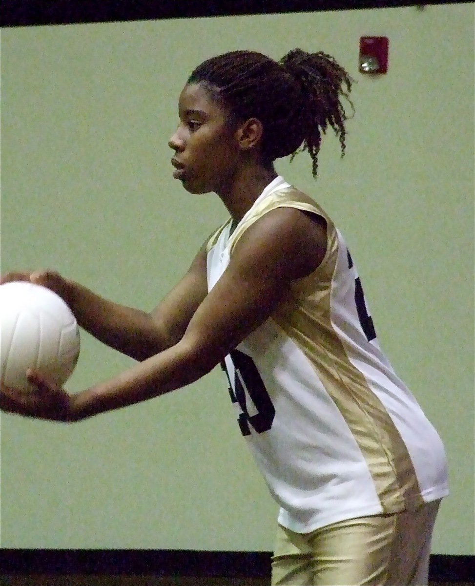 Image: Raven Harper(20) is about to serve an ace against Keene.