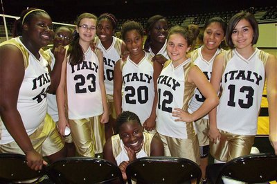 Image: The Italy Jr. High 8th grade girls “A” volleyball team celebrate a win.