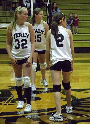 Image: Hannah Washington(32), Lilly Perry(25) and Cassidy Childers(2) were all business at the net against Keene.