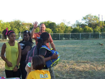 Image: Italy High School principal Lee Joffre giving out “high fives.”
