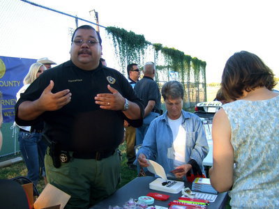 Image: Deputy Hernandez with the Ellis County Sheriff’s department was there manning a booth and he explained, “We are in Italy tonight for the National Night Out event. We are here to inform the public about general safety. We are going to answer any questions. We have material on gun safety and other educational information to help inform the public.”