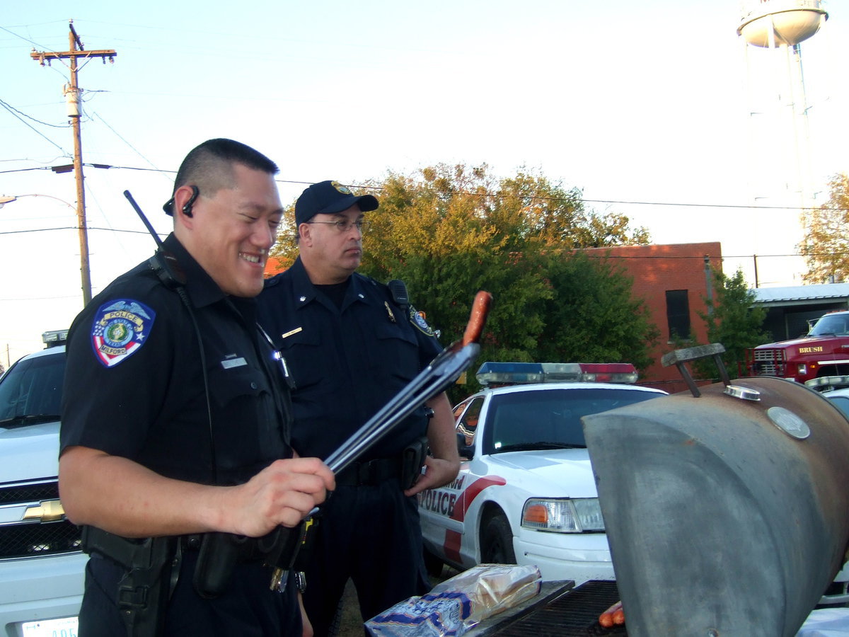 Image: Officer Chin looks hungry as he eyes this hot dog.