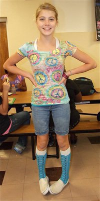 Image: The peace surge of the 1980s was global in scope and is once again supported by Halee Turner during 80’s Day at Italy High SChool.