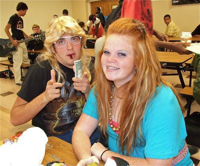 Image: Zackery Boykin has the mullet and Katie Byers has the big hair for 80’s Day.
