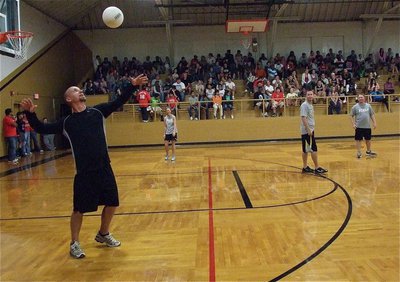 Image: Jeff Richters serves up some pain for the students during the student and staff volleyball game.