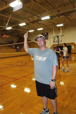 Image: Coach Ward shows the carnage he leaves behind after taking the court during the Student and Staff volleyball game.