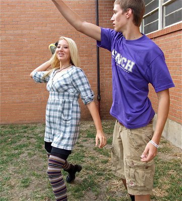 Image: Megan Richards plays a tacky game of football with Alex DeMoss and friends within the senior courtyard at IHS.