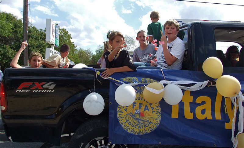 Image: Italy FFA shows their spirit during their parade.