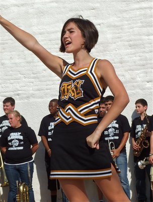 Image: Italy Jr. High Cheerleader Kaci Bales helps raise the spirit during the pep rally.