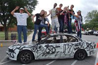 Image: Sophomores sponsor a Car Bash to raise class funds and school spirit during Homecoming week.