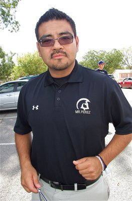 Image: Gladiator Regiment Marching Band director Jesus Perez displays his personalized Gladiator wear.