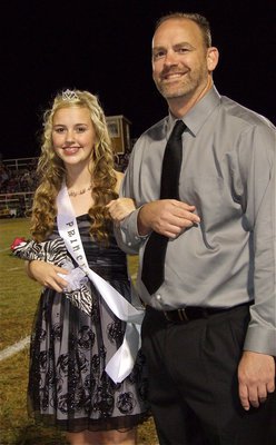 Image: IHS Homecoming Freshman Princess Kelsey Nelson is escorted by her father Doug Neslon.