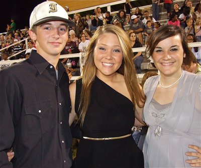 Image: Italy’s 2010 Homecoming Queen Shelbi Gilley (middle) is welcomed back by Ross Stiles and Kaytlyn Bales.