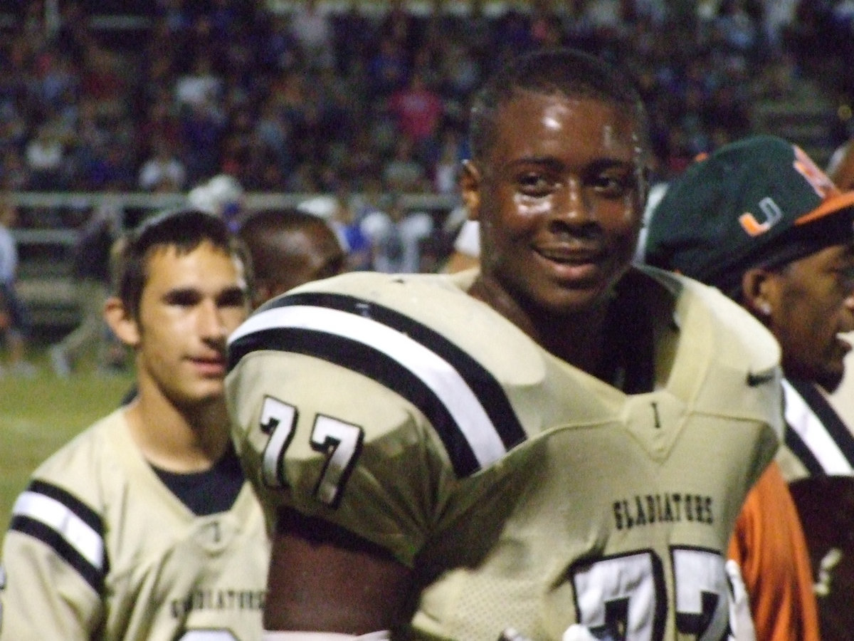 Image: The crowd cheers for defensive tackle Larry Mayberry, Jr. after his interception return for a touchdown.