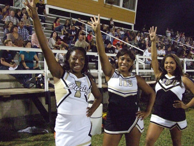 Image: IHS Cheerleaders Jameka Copeland, Ashley Harper and Destani Anderson get ready for 4th quarter action.
