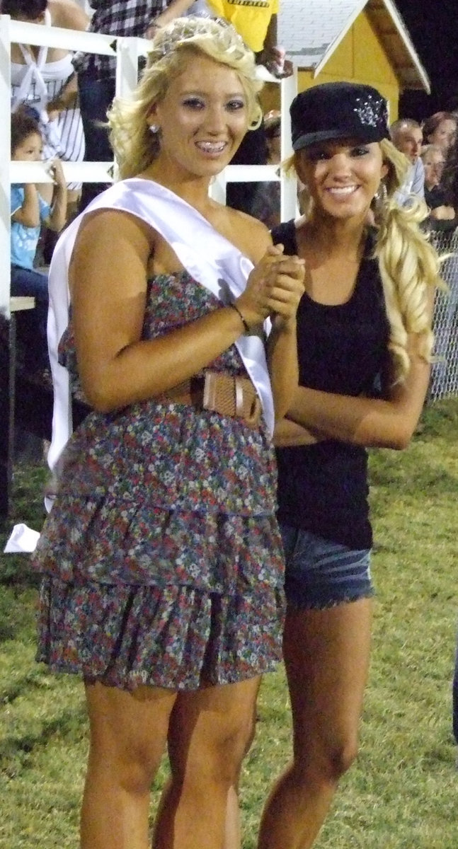 Image: Megan Richards and Sierra Harris get ready for the closing ceremony.