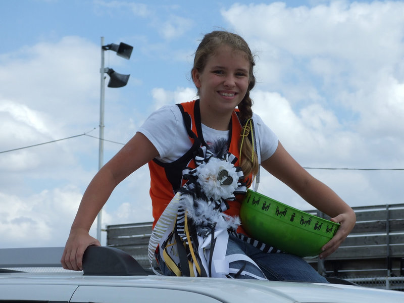 Image: Jill Varner takes the high spot to throw candy.