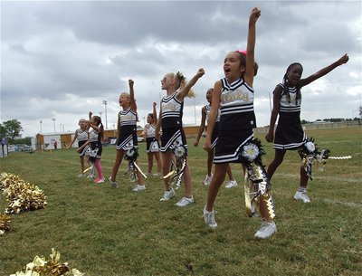 Image: IYAA B-Team cheerleaders keep Homecoming fans into the game.