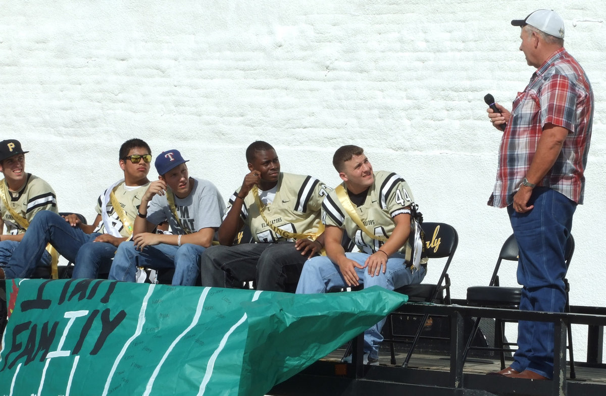 Image: Gladiator Fan of the Year, Richard Cook, gave a riveting speech to the team at the pep rally,  “Send those Lions home with their tails between their legs!”  A speech like this could have brought Blooming Grove to their knees.