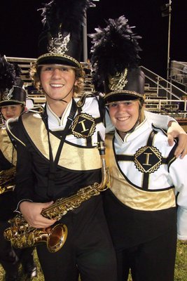 Image: Gladiator Regiment Marching Band members JoeMack Pitts and Drenda Burk are excited about performing during halftime.