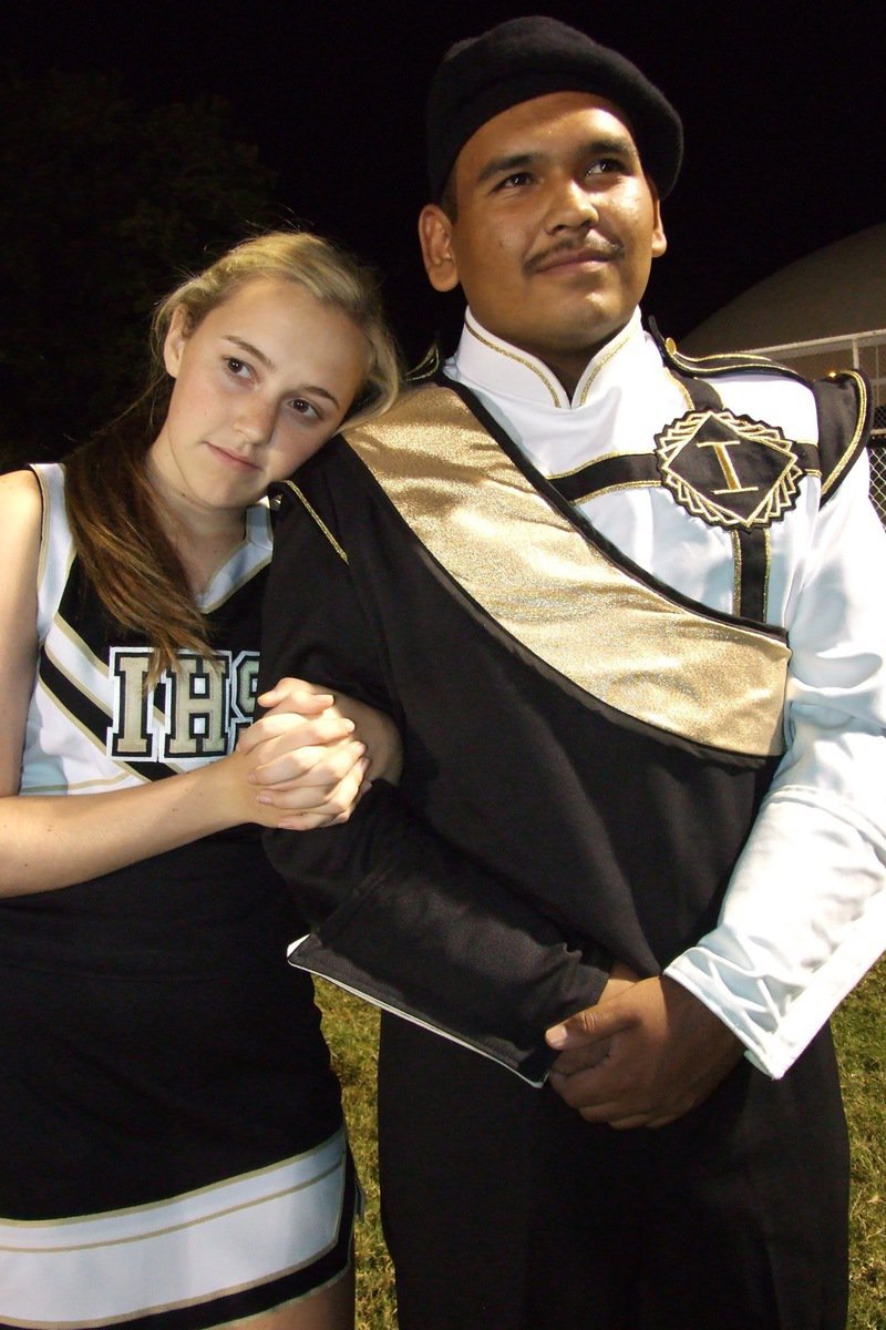 Image: There was a lot of love on Willis Field Friday night! IHS cheerleader Kelsey Nelson leans on fellow band member Yonatan Devila for emotional support during the thriller between Italy and Buffalo.