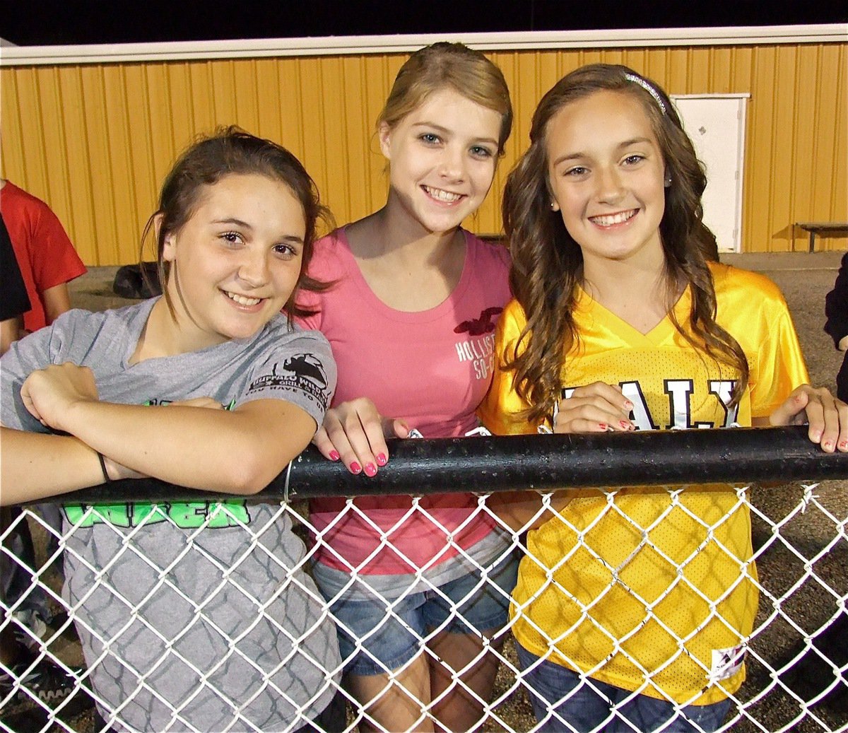 Image: Sarah Coleman, Halee Turner and Jozie Perkins watch the action from the back of the endzone.