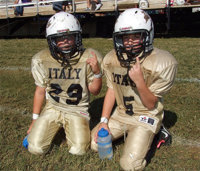 Image: Gage Wafer(29) and Eric Martinez(5) take a water break during their B-Team game against the Lions.