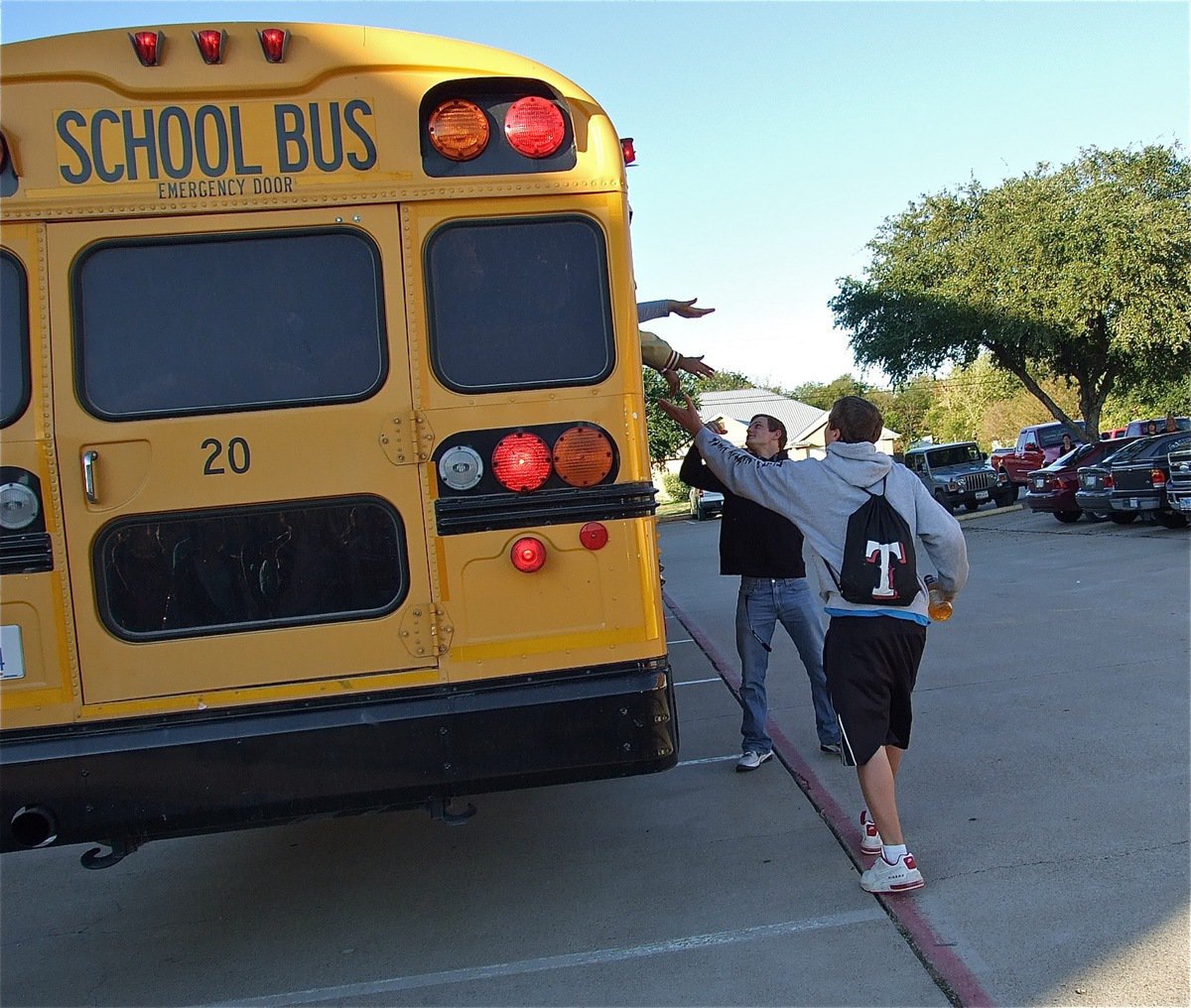 Image: Bailey Walton and Chase Hamilton wish the band crew good luck before leaving for LaVega.