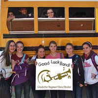 Image: Gladiator Regiment Marching Band members, Reid Jacinto, alumni Taz Martinez (’10) and Reagan Adams gaze form the bus windows as IHS students Amber Hooker, Kayla Cunningham, Sarah Coleman, Hailey Turner, Britney Chambers and Cassidy Childers wish them, "Good luck!