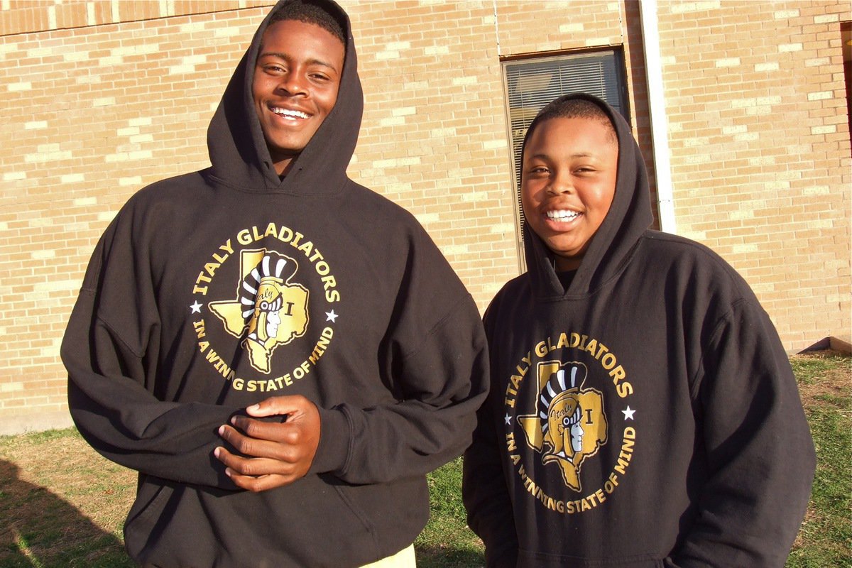 Image: Brothers Larry Mayberry and Darol Mayberry are both members of the Gladiator football program and are on hand to cheer on the band.