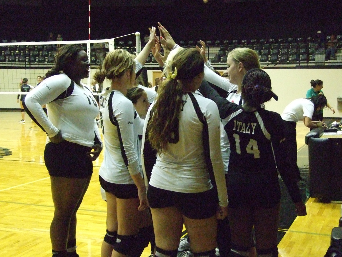 Image: The Lady Gladiators huddle up.