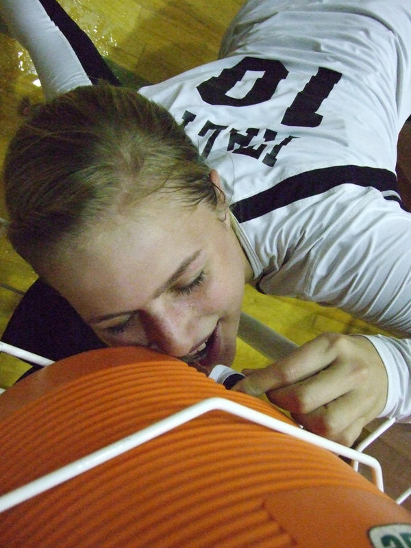 Image: It’s time for a refreshment.  Maddy Washington takes a quick drink from the cooler.